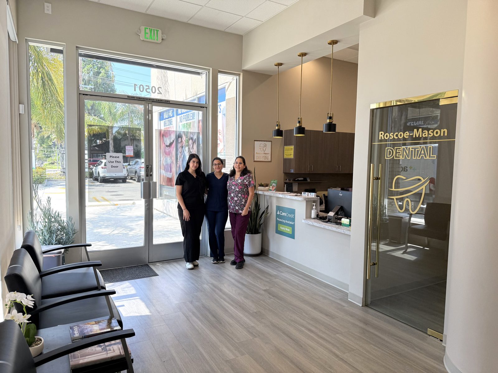Roscoe Mason Dental care team — friendly bilingual staff welcoming patients in Winnetka