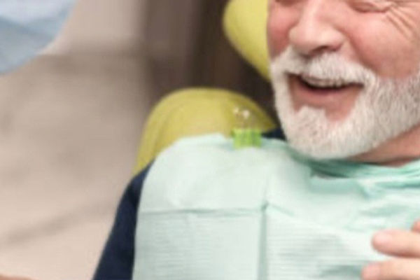 Patient receiving restorative dental treatment — fillings and crowns at Roscoe Mason Dental